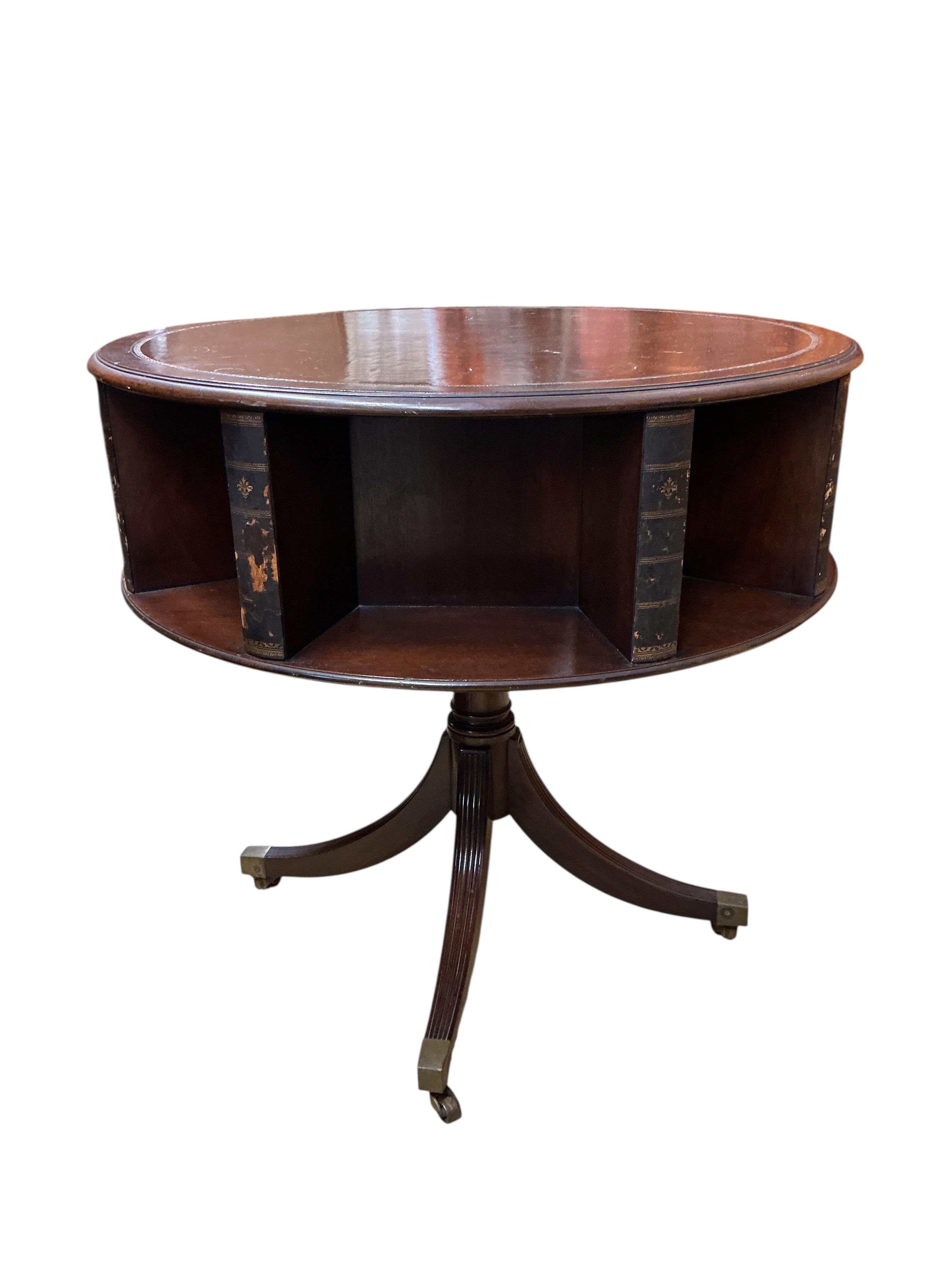 A George III style circular mahogany reading table, diameter 80cm, height 77cm